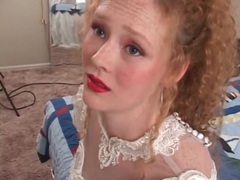 ChiliMoms presents: Redhead in wedding dress models her pussy